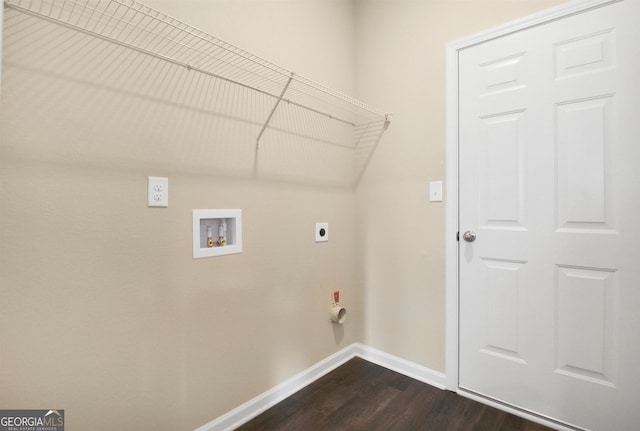 laundry area with electric dryer hookup, hookup for a washing machine, and dark wood-type flooring