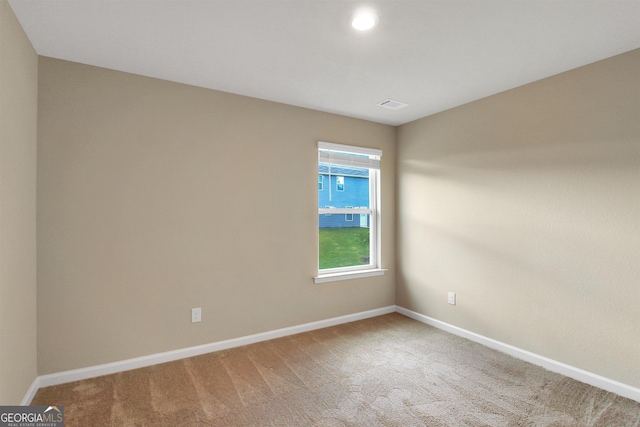 spare room with carpet flooring