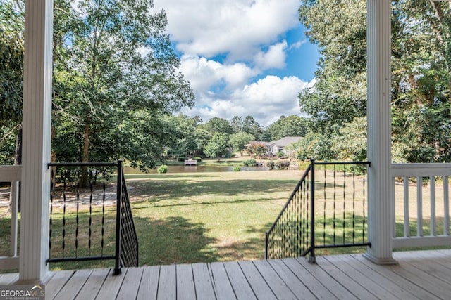 304 Stathams Way, Warner Robins, GA 31088 - wooden deck with a lawn and view of wooded area