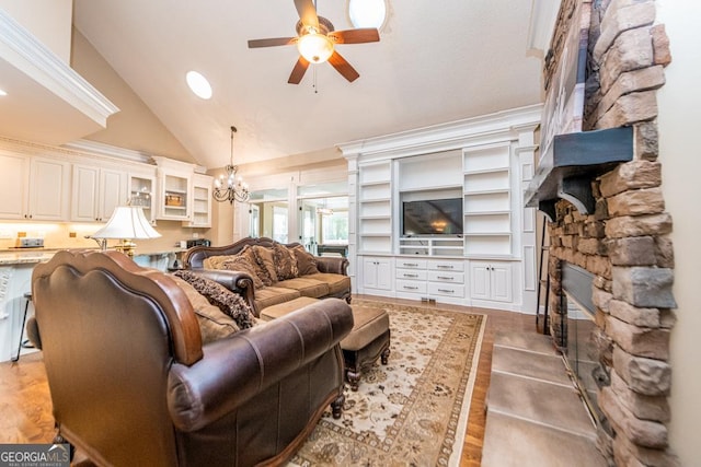 304 Stathams Way, Warner Robins, GA 31088 - living area featuring a stone fireplace, ceiling fan, a chandelier, high vaulted ceiling, and recessed lighting
