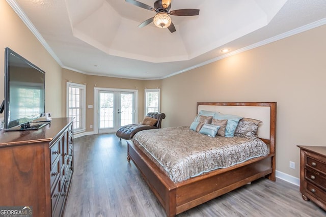 304 Stathams Way, Warner Robins, GA 31088 - bedroom with a tray ceiling, wood finished floors, access to outside, french doors, and baseboards