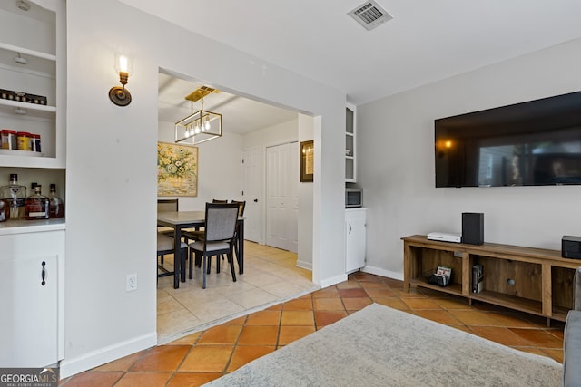 tiled dining space with built in features