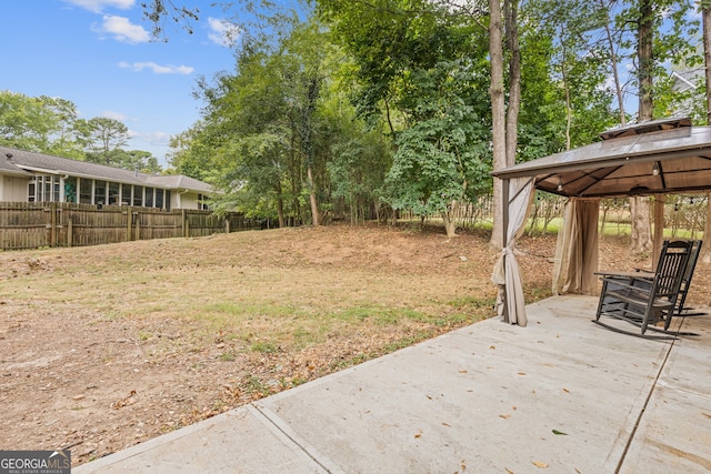 view of yard featuring a gazebo and a patio