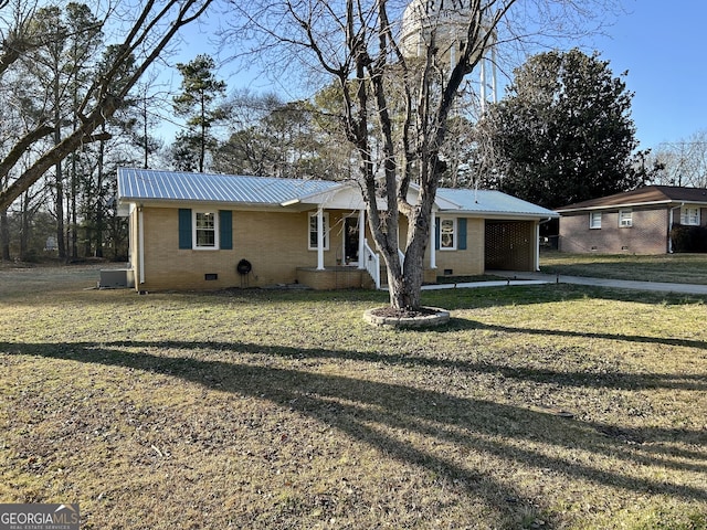 ranch-style home with a front yard