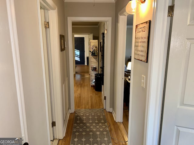 corridor featuring light hardwood / wood-style floors