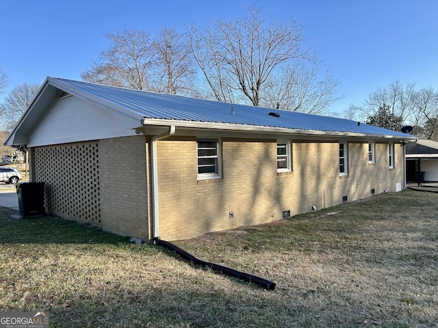 view of property exterior featuring a lawn