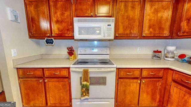 kitchen featuring white appliances