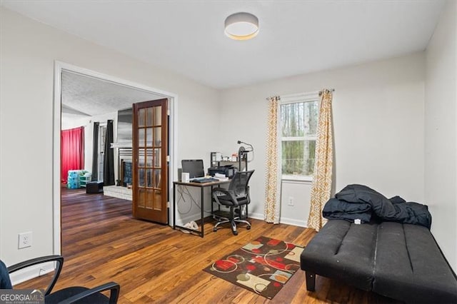 office area with dark hardwood / wood-style flooring