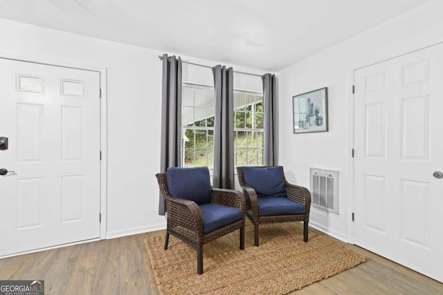 living area featuring hardwood / wood-style floors