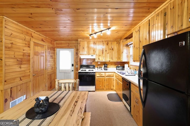 kitchen with sink, light carpet, wooden ceiling, track lighting, and black appliances