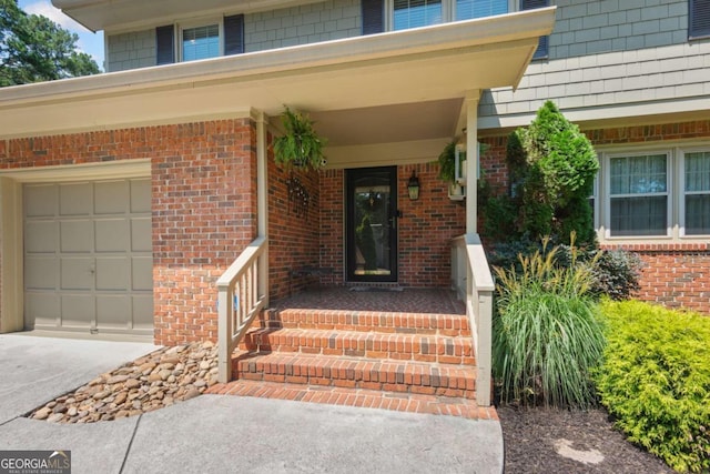 property entrance with a garage