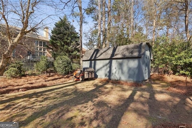 exterior space featuring a shed