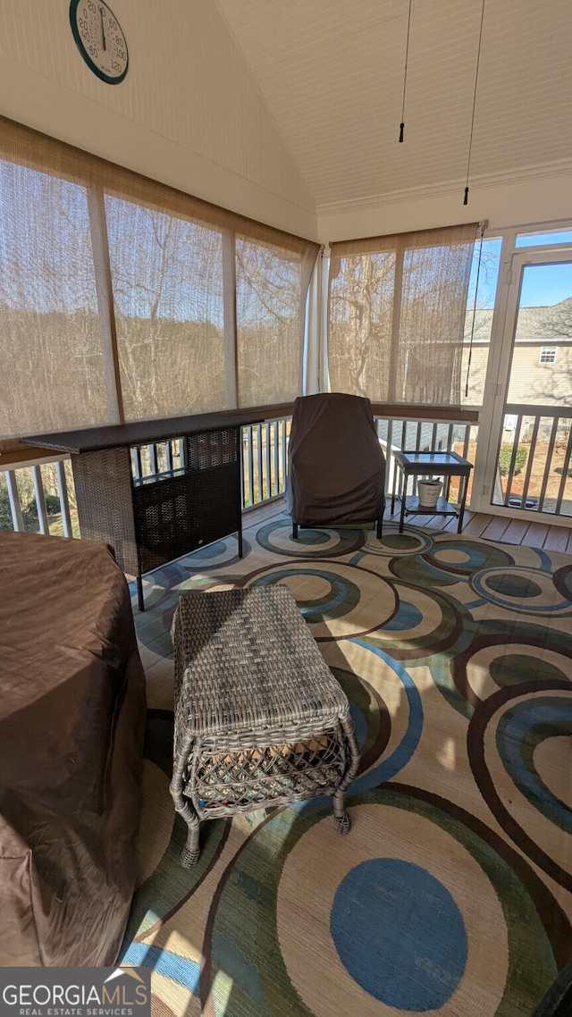 sunroom with vaulted ceiling