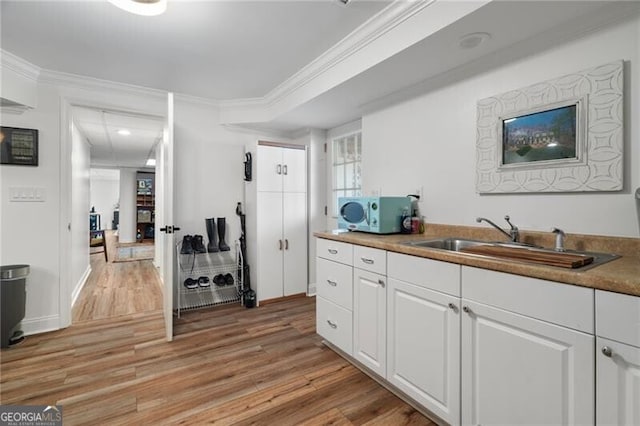 office featuring hardwood / wood-style flooring and a paneled ceiling