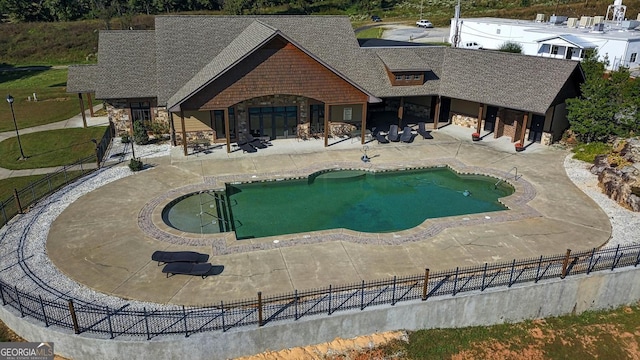 view of pool featuring a patio