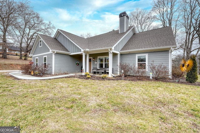 view of front of property with a front lawn