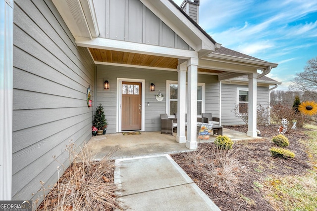 entrance to property with a patio