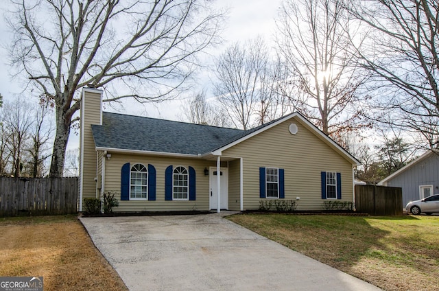 view of front of property with a front lawn