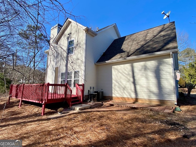 4299 High Country Dr, Douglasville, GA 30135 - back of property featuring a wooden deck and cooling unit