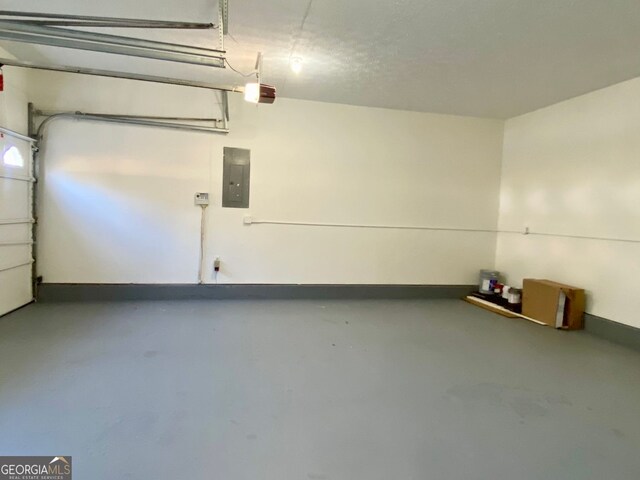 4299 High Country Dr, Douglasville, GA 30135 - garage with a garage door opener and electric panel