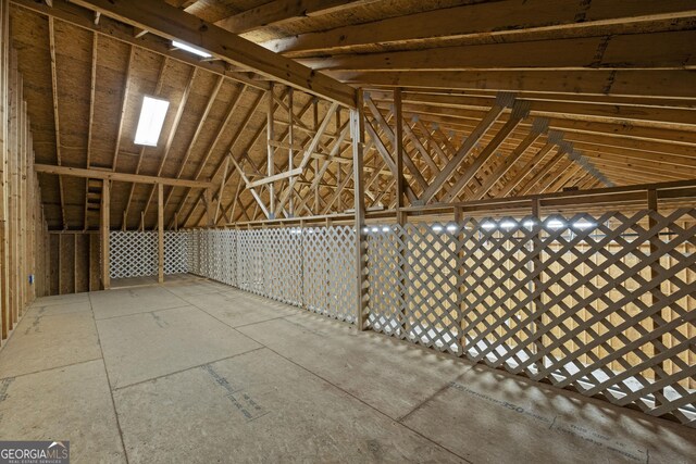 miscellaneous room featuring vaulted ceiling