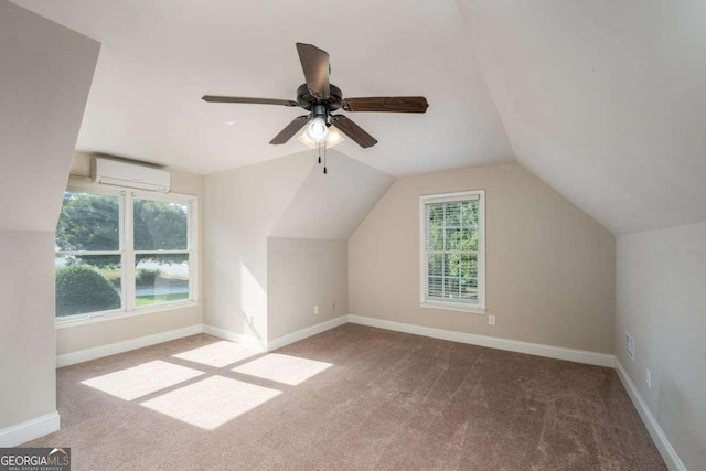 additional living space with an AC wall unit, light carpet, and lofted ceiling