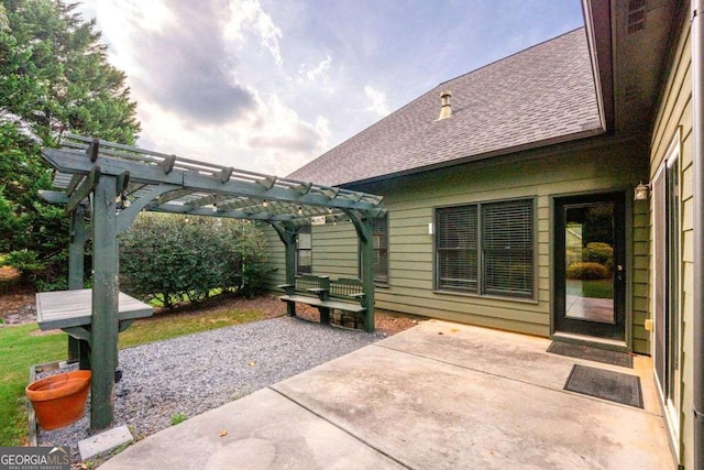 view of patio featuring a pergola