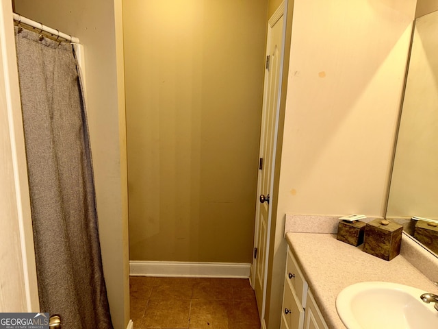 bathroom with vanity and tile patterned floors