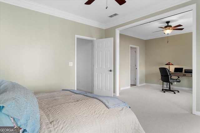 bedroom with crown molding, ceiling fan, and carpet floors