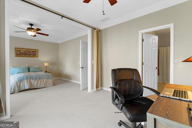 carpeted bedroom featuring ornamental molding and ceiling fan