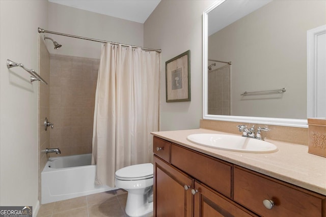 full bathroom featuring tile patterned flooring, vanity, shower / tub combo, and toilet