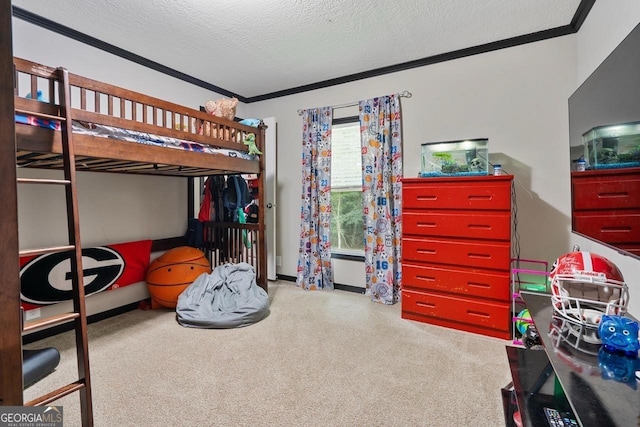 bedroom featuring ornamental molding and a textured ceiling