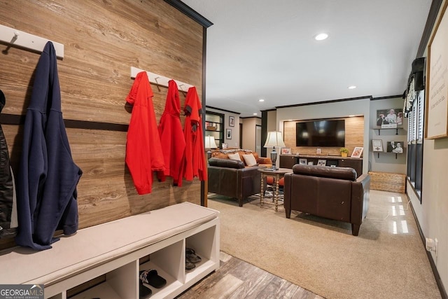 mudroom featuring crown molding