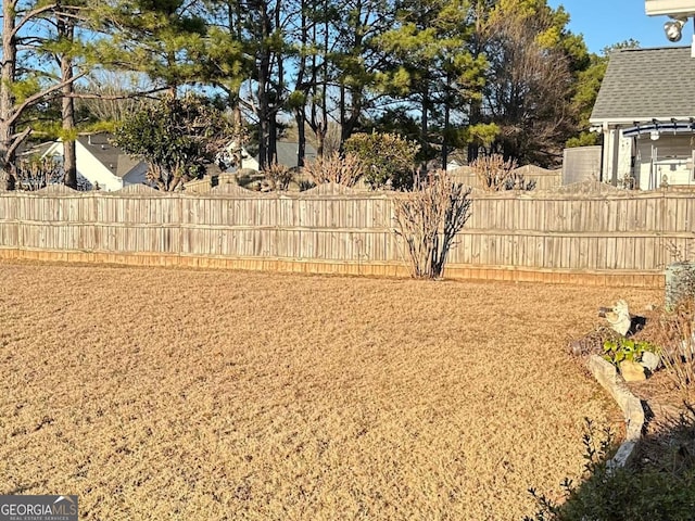 view of yard featuring fence