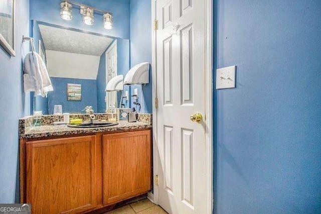 bathroom featuring vanity and tile patterned floors