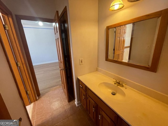 bathroom featuring vanity and tile patterned flooring