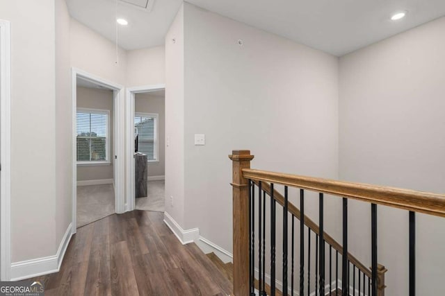 hall with dark hardwood / wood-style floors