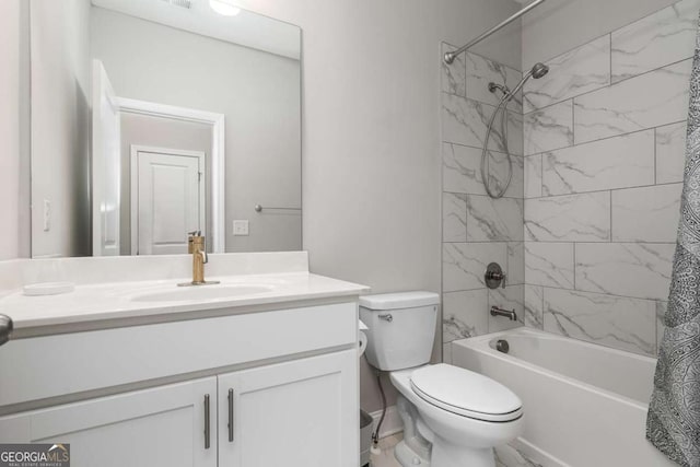 full bathroom with vanity, shower / bath combination with curtain, and toilet