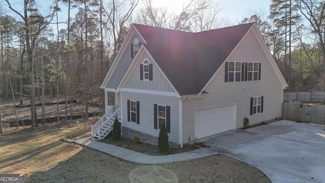 view of side of property with a garage