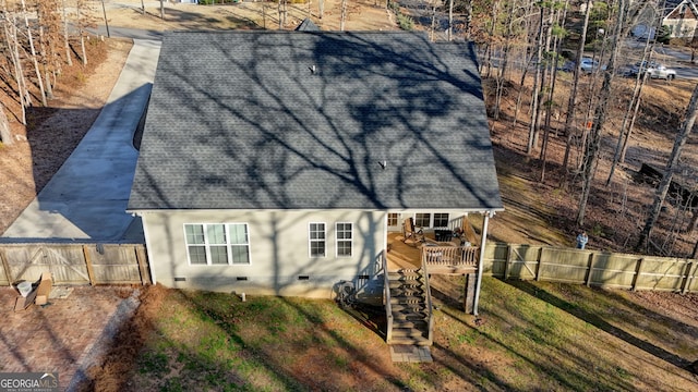 back of property featuring a deck