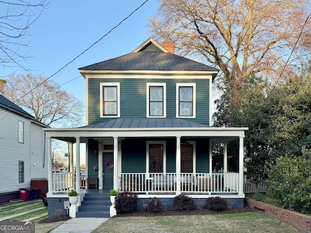 view of front of house with covered porch