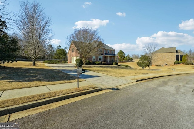 view of front facade with a front lawn