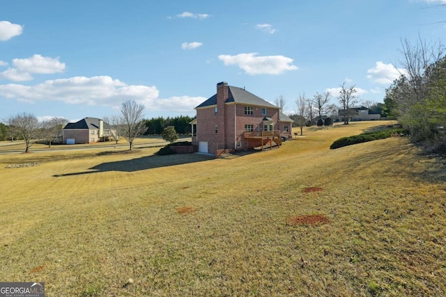 view of yard featuring a deck