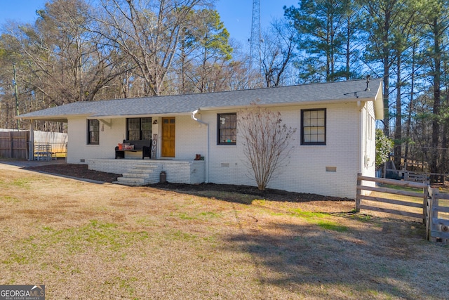 view of front of home with a porch and a front lawn