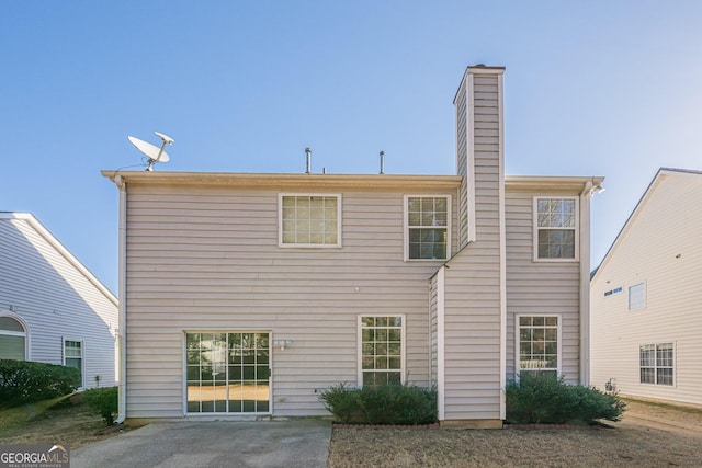 rear view of house featuring a patio area