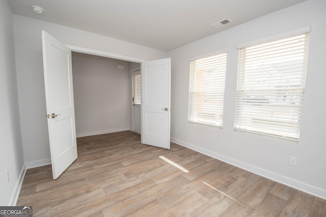 unfurnished bedroom featuring light hardwood / wood-style flooring