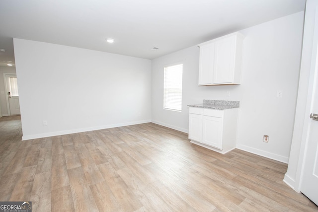 interior space with light hardwood / wood-style flooring