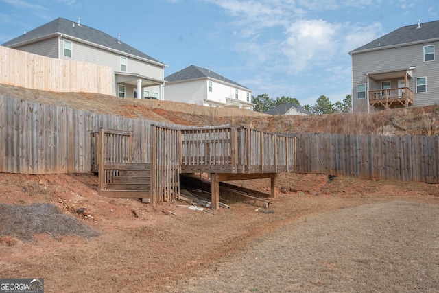 view of yard with a wooden deck