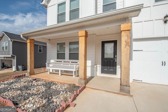 doorway to property featuring a porch