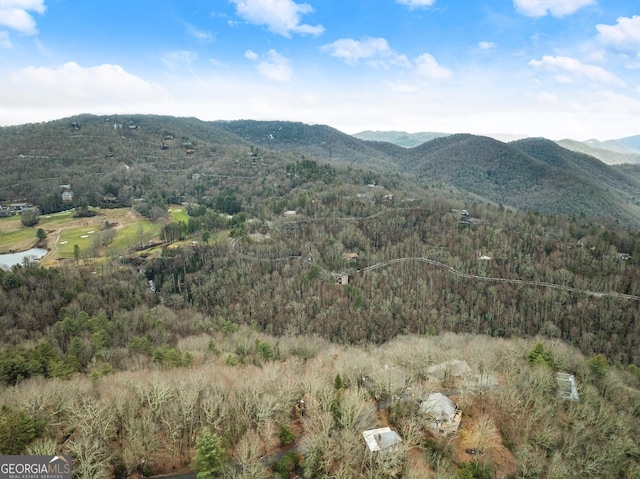 mountain view featuring a view of trees